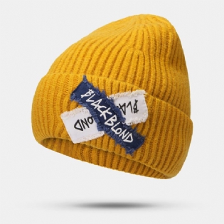 Kvinder Strikket Ensfarvet Bogstav Rå Kant Patch Flanging All-match Warm Beanie Hat