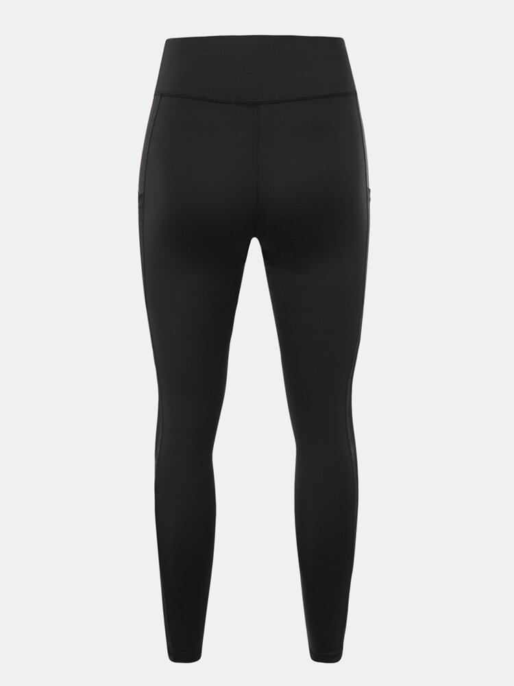 Kvinder Ensfarvet Mesh Patchwork Hip Lift Sport Yoga Leggings