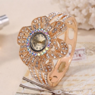 Fashion Crystal Flower Shape Urskive Hul Metal Strap Kvinder Quartz Watch